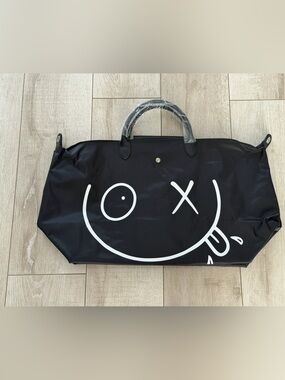 Longchamp Andre Black Weekender smiley duffle new no tags